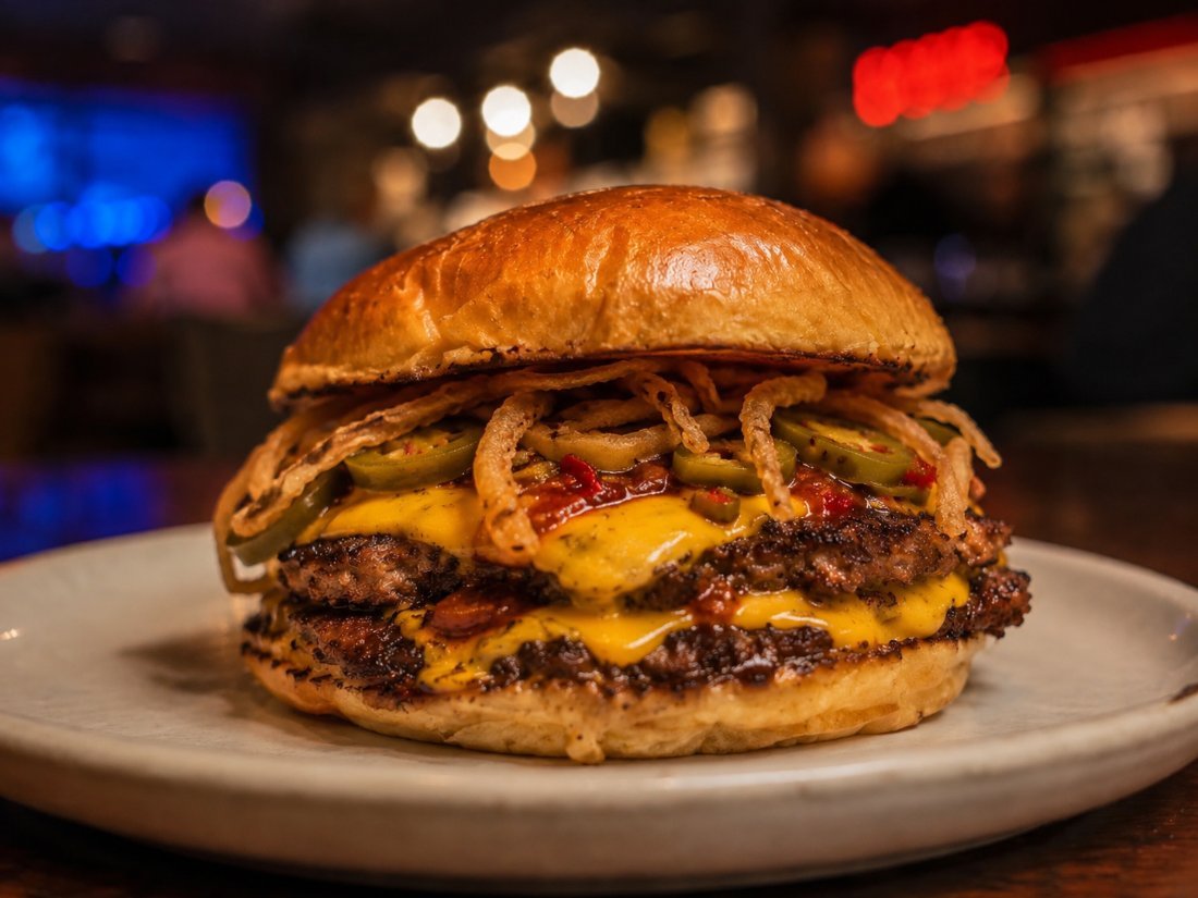 La Soufrière — double steak, double cheddar, jalapeños, sauce chili